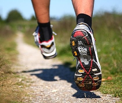 Good shoes are essential for running on hard surfaces, especially if its uneven.